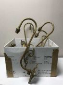 Nine decorative brass wall lights