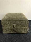 Upholstered ottoman footstool