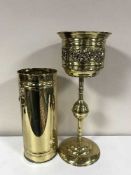 A brass stick stand and a brass embossed planter on stand