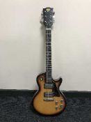 A Hondo II electric guitar in carry bag