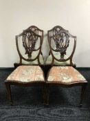 A set of four late Victorian dining chairs