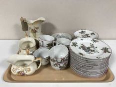 A tray of thirty three pieces of Frank Haviland tea china,
