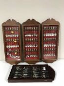 Four cases of collector's spoons