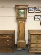 A continental oak eight-day longcase clock, with brass dial.
