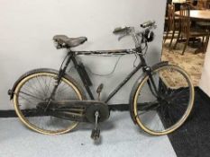 A mid 20th century Triumph cycle