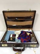 A leather case of Free Masons regalia and medals