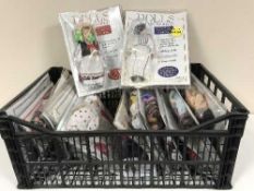 A box of Dolls of the world dolls and magazines