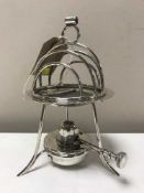 A silver plated toast rack and warmer by Asprey & Company