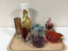 A tray of seven pieces of coloured glass ware