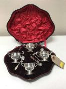 Four cased silver mustard pots with spoons,
