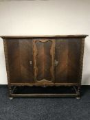 An early twentieth century continental oak sideboard