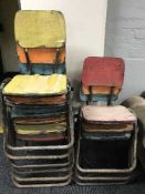 Eight mid 20th century metal framed stacking chairs