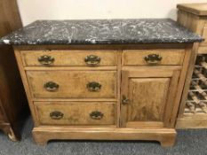 A walnut marble-topped cabinet, fitted with a cupboard and four drawers, width 107 cm.