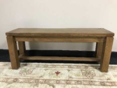A contemporary oak bench