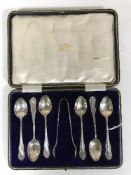 A cased set of six silver teaspoons with tongs