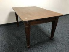 A Victorian mahogany dining table