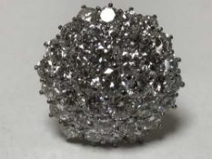 A fine diamond cluster ring, flower-head multistone, head width 23.1mm x 24.