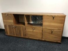 A mid 20th century teak low sideboard