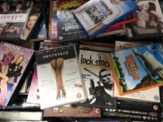 Three boxes and a suitcase of DVDs