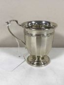 A small silver mug, 2.