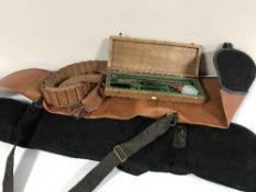 A basket of two gun bags,