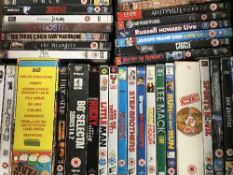 A box of assorted DVDs