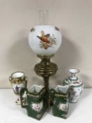 A brass oil lamp with shade, continental vases,