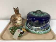 A Majolica style cheese dish and cover,
