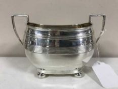 A sterling silver twin-handled sugar bowl,