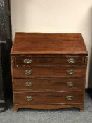 A Georgian-style inlaid mahogany writing bureau, width 92 cm.