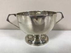 A silver twin handled dish, 3.