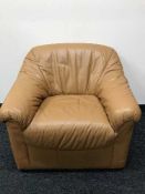 A brown leather armchair