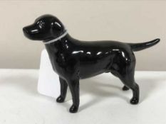 A Beswick black labrador