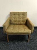 A mid 20th century rosewood armchair