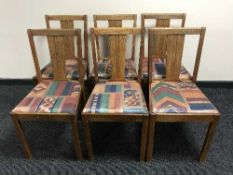 Six oak dining chairs