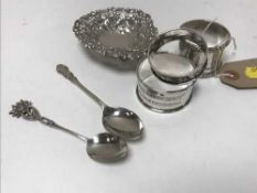 Three silver napkin rings, teaspoons,