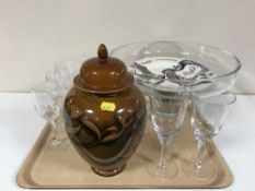 A large LSA glass bowl on stand, lead crystal glasses, two wall clocks,