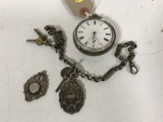 A silver cased pocket watch, silver Albert chain,