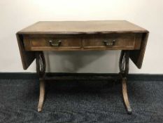An inlaid mahogany sofa table