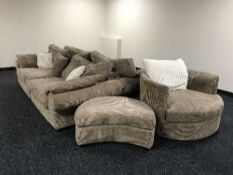 A three piece lounge suite and a footstool