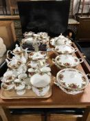 Seventy seven pieces of Royal Albert Old Country Roses tea and dinner ware with boxed place mats