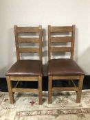 Six oak ladder back dining chairs