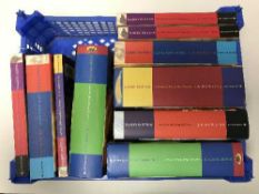 A basket of eleven volumes of Harry Potter