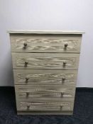 A five drawer contemporary chest