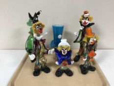 A tray of four Murano glass clowns,