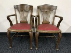 A pair of mahogany office armchairs