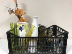 A box of pottery and glass