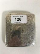 A silver cigarette case, Birmingham marks, 3.