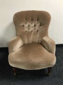 A lady's button dralon armchair