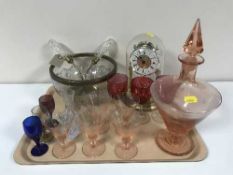 A tray of pink glass Art Deco decanter and glasses, pressed glass bowl and server,